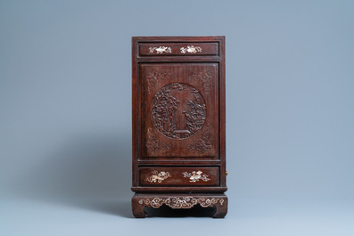 A Chinese mother-of-pearl-inlaid wooden two-door cabinet, 19th C.