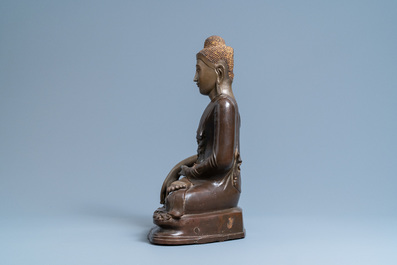 A Mandalay partly lacquered bronze figure of Buddha, Burma, 18/19th C.