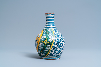 A polychrome Italian maiolica armorial pharmacy bottle, Deruta, 17th C.