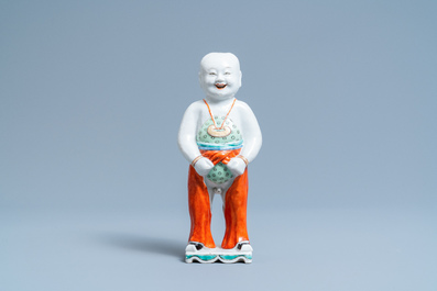 A Chinese famille verte water dropper modelled as a peeing boy, Qianlong