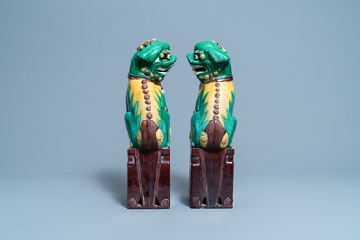 A pair of tall Chinese sancai-glazed biscuit models of Buddhist lions, 19/20th C.