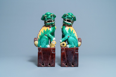 A pair of tall Chinese sancai-glazed biscuit models of Buddhist lions, 19/20th C.