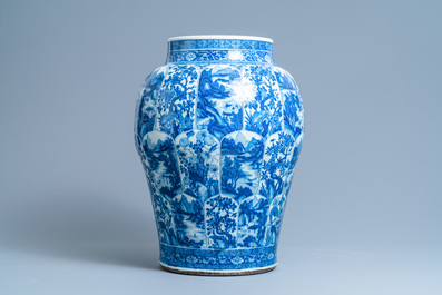 A massive Chinese blue and white vase with floral and landscape panels, Kangxi