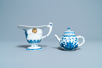 Six Chinese blue and white dishes, a teapot and a helmet-shaped jug, Kangxi and later