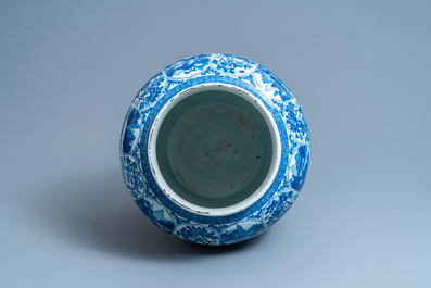 A massive Chinese blue and white vase with floral and landscape panels, Kangxi