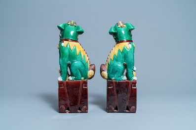 A pair of tall Chinese sancai-glazed biscuit models of Buddhist lions, 19/20th C.