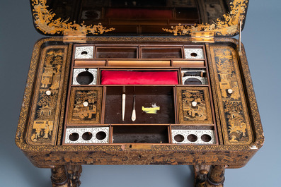 A Chinese parcel-gilt black lacquer sewing table with accessories, Canton, 19th C.