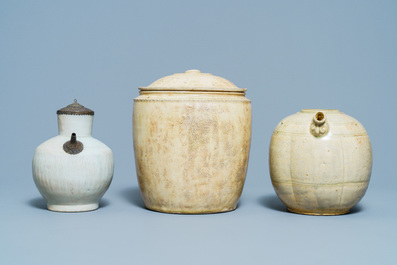 A Chinese celadon-glazed 'Jue' ewer, a qingbai-glazed wine ewer and a storage vessel, Song/Yuan