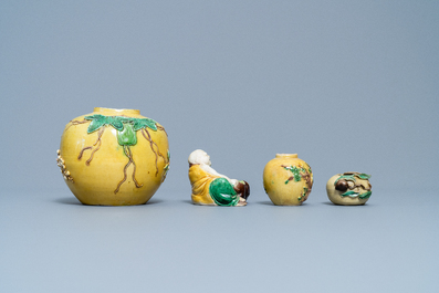 Two Chinese yellow and verte biscuit jars, a Buddha figure and a peach-shaped brush washer, 19/20th C.