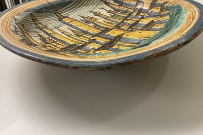 A large Italian maiolica dish with a view on San Gimignano, Deruta, 16/17th C.