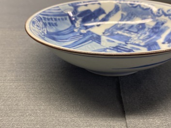 A fine Chinese blue and white Xi Xiang Ji 'temple scene' shallow bowl, Jiajing mark, Kangxi