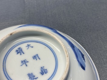 A fine Chinese blue and white Xi Xiang Ji 'temple scene' shallow bowl, Jiajing mark, Kangxi