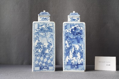 A pair of Chinese blue and white square vases and covers, Kangxi