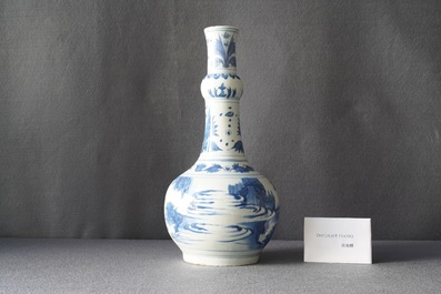 A Chinese blue and white bottle vase with figures in a landscape, Transitional period