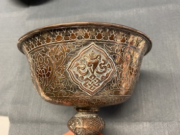 A pair of Tibetan silvered copper alloy altar bowls, 19/20th C.