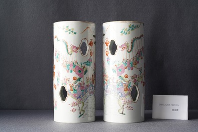 A pair of reticulated Chinese famille rose '100 boys' hat stands, Qianlong mark, 19th C.