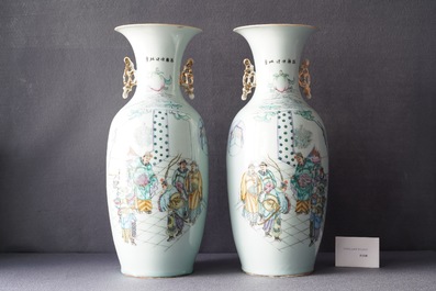 A pair of Chinese famille rose 'court scene' vases, 19/20th C.