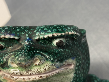 A pair of Chinese famille verte models of toads on wooden stands, 19th C.