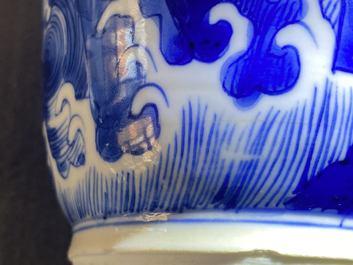 Een Chinese blauw-witte rouleau vaas met kylins, Kangxi