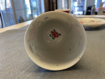 A Chinese famille rose cup and saucer with a bird on a blossoming branch, Yongzheng