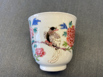 A Chinese famille rose cup and saucer with a bird on a blossoming branch, Yongzheng