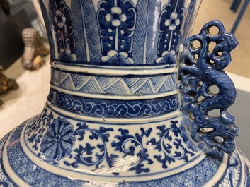 A Chinese blue and white 'hu' vase with floral design, Qianlong mark, 19th C.