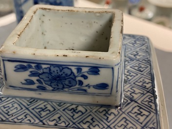 A pair of Chinese blue and white square vases and covers, Kangxi