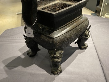 A large Chinese bronze censer and cover, Ming