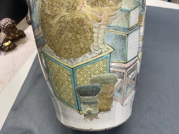 A pair of Chinese qianjiang cai vases with antiquities and buddhist lions, 19/20th C.