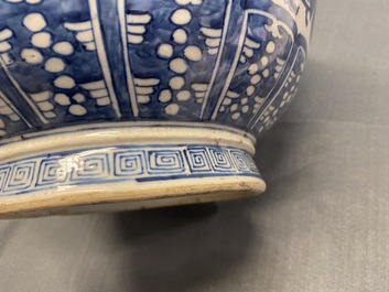 A Chinese blue and white 'hu' vase with floral design, Qianlong mark, 19th C.