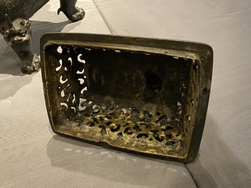 A large Chinese bronze censer and cover, Ming