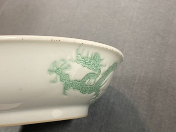 A Chinese incised and green-glazed 'dragon' dish, Hongzhi mark, Ming