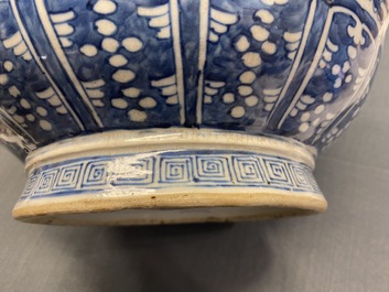 A Chinese blue and white 'hu' vase with floral design, Qianlong mark, 19th C.