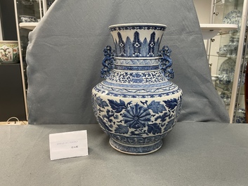 A Chinese blue and white 'hu' vase with floral design, Qianlong mark, 19th C.