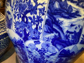 A massive Chinese blue and white vase with floral and landscape panels, Kangxi