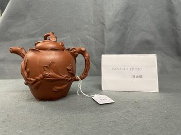 A Chinese Yixing stoneware lotus-shaped teapot and cover, Kangxi