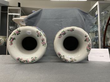 A pair of Chinese famille rose 'court scene' vases, 19th C.