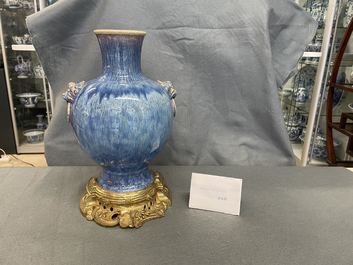 A Chinese gilt bronze-mounted flamb&eacute;-glazed vase, 18/19th C.