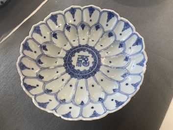 A Chinese blue and white lotus-molded dish, Kangxi mark and of the period