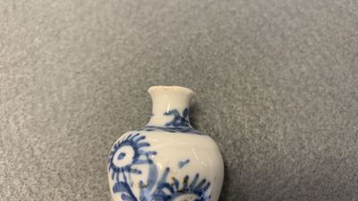 Fifteen Chinese mostly blue and white miniature vases, Kangxi