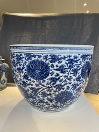 An exceptionally large Chinese blue and white 'lotus scroll' fish bowl, Kangxi