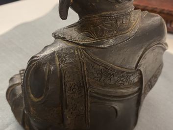 A Chinese bronze figure of Buddha, Ming