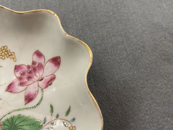 A Chinese famille rose 'lotus' cup and saucer with applied design, Yongzheng