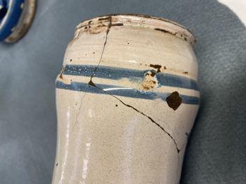 A collection of five Spanish blue and white albarello-type drug jars, 17th C.