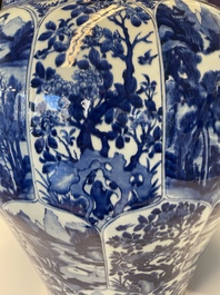 A massive Chinese blue and white vase with floral and landscape panels, Kangxi