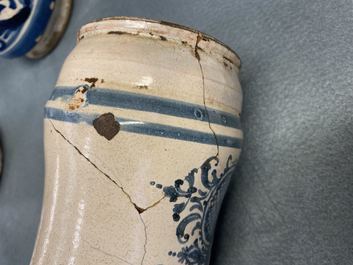 A collection of five Spanish blue and white albarello-type drug jars, 17th C.