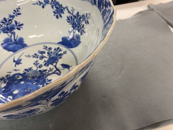 A large Chinese blue and white bowl with floral panels, Kangxi