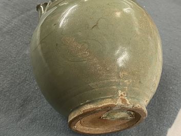 A Chinese Longquan celadon five-spouted urn, Song