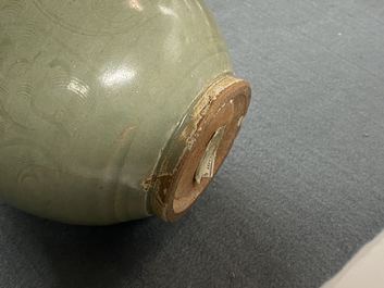 A Chinese Longquan celadon five-spouted urn, Song