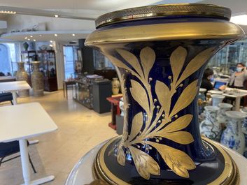 A pair of massive French S&egrave;vres-style vases with gilt bronze mounts, signed Desprez, 19th C.